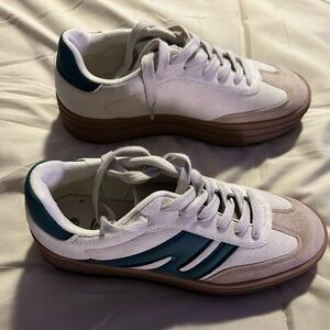 Boutique platform style sneakers. Brand new in box. Size 10.